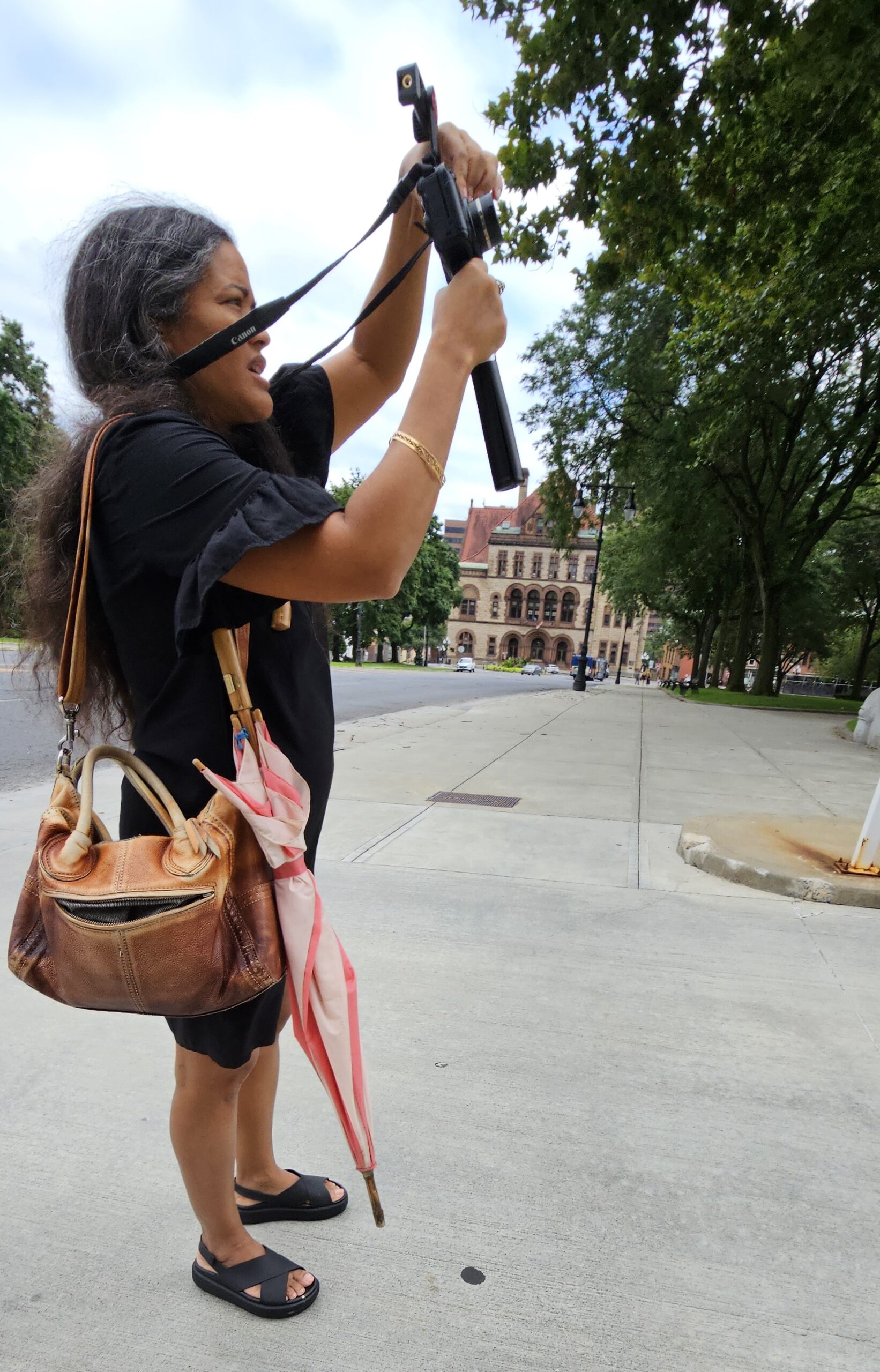 Yep, that is me carrying the most uncomfortable umbrella all day and not a drop of water in sight, yes cloudy and just incase.