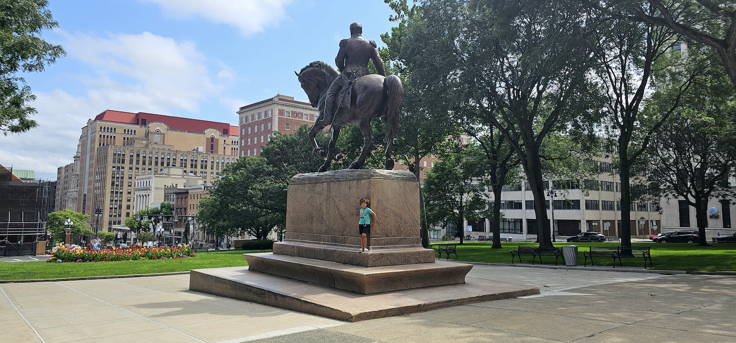 This garden is in front of the front of New York State Capitol. The honorable equestrian statue is of Phillip Sheridan and has been there for 108 years as of 2025. Who was Phillip Sheridan?